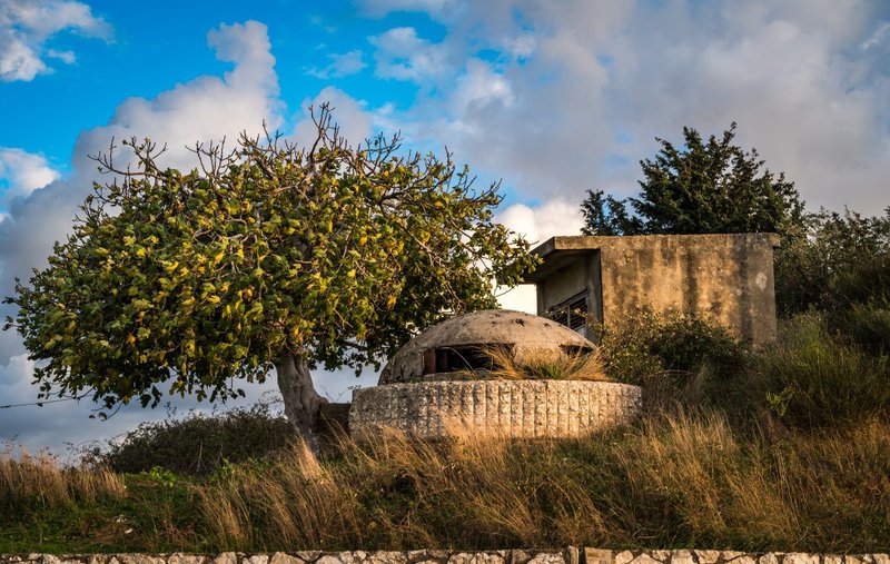 shutterstock_Bunker-in-Albania-near-tourist-area-Zvernec-Island-in-Narta-Lagoon-near-Vlore.jpg